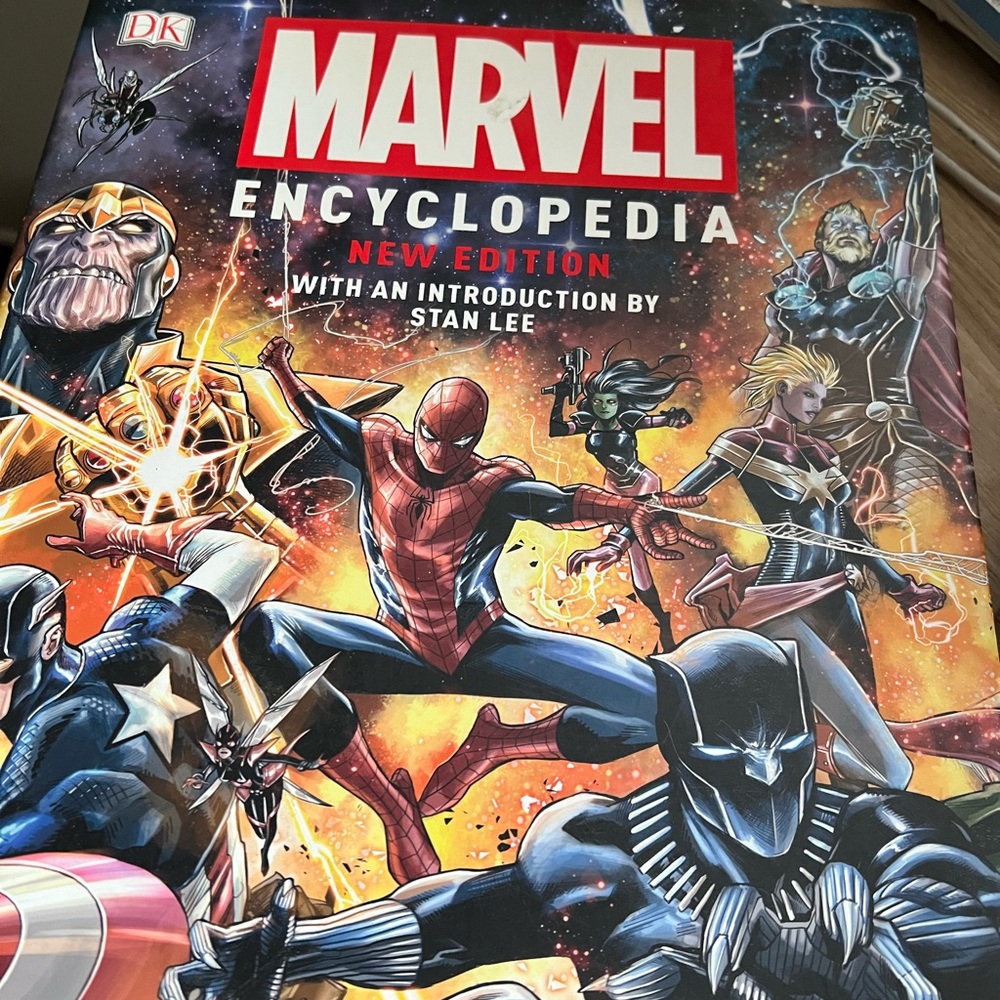 Marvel Encyclopedia with Vibrant Red and Blue Cover